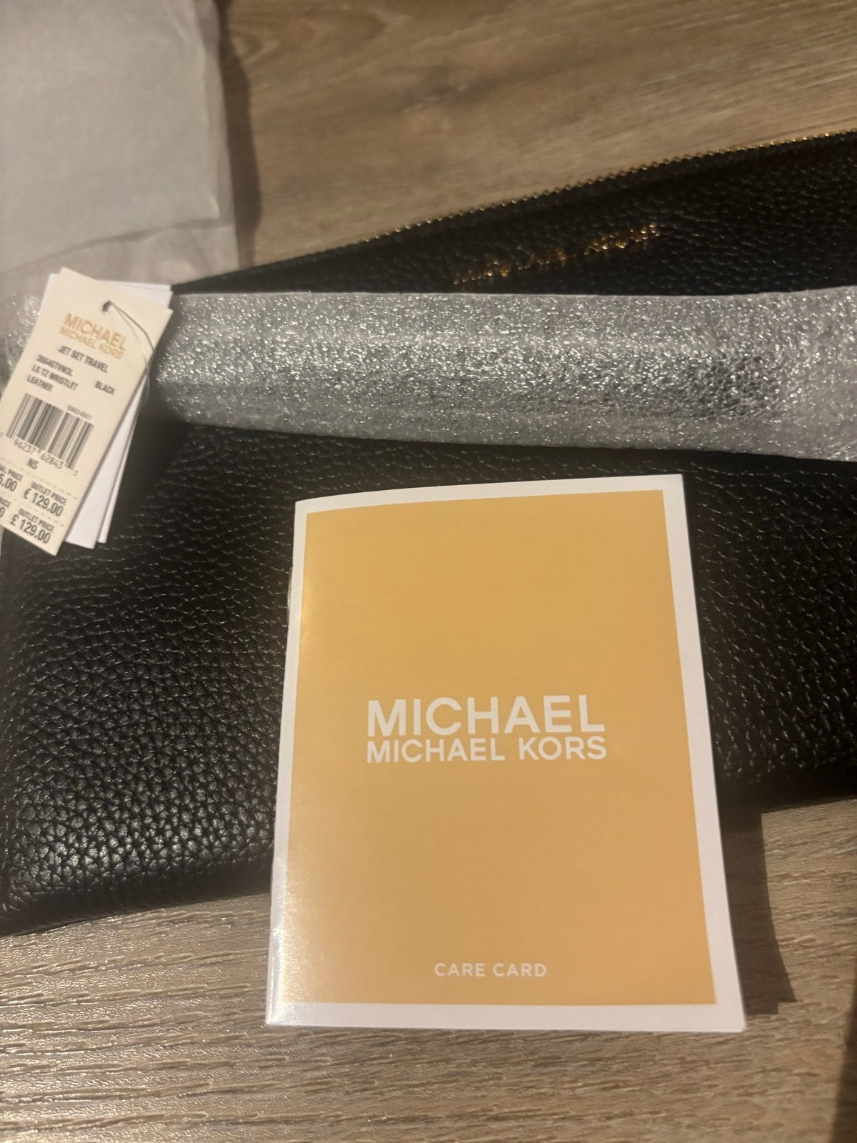 Michael Kors Jet Set Travel leren tasje met polsbandje Nieuw, Ophalen of Verzenden, Nieuw, Zwart, Avondtasje