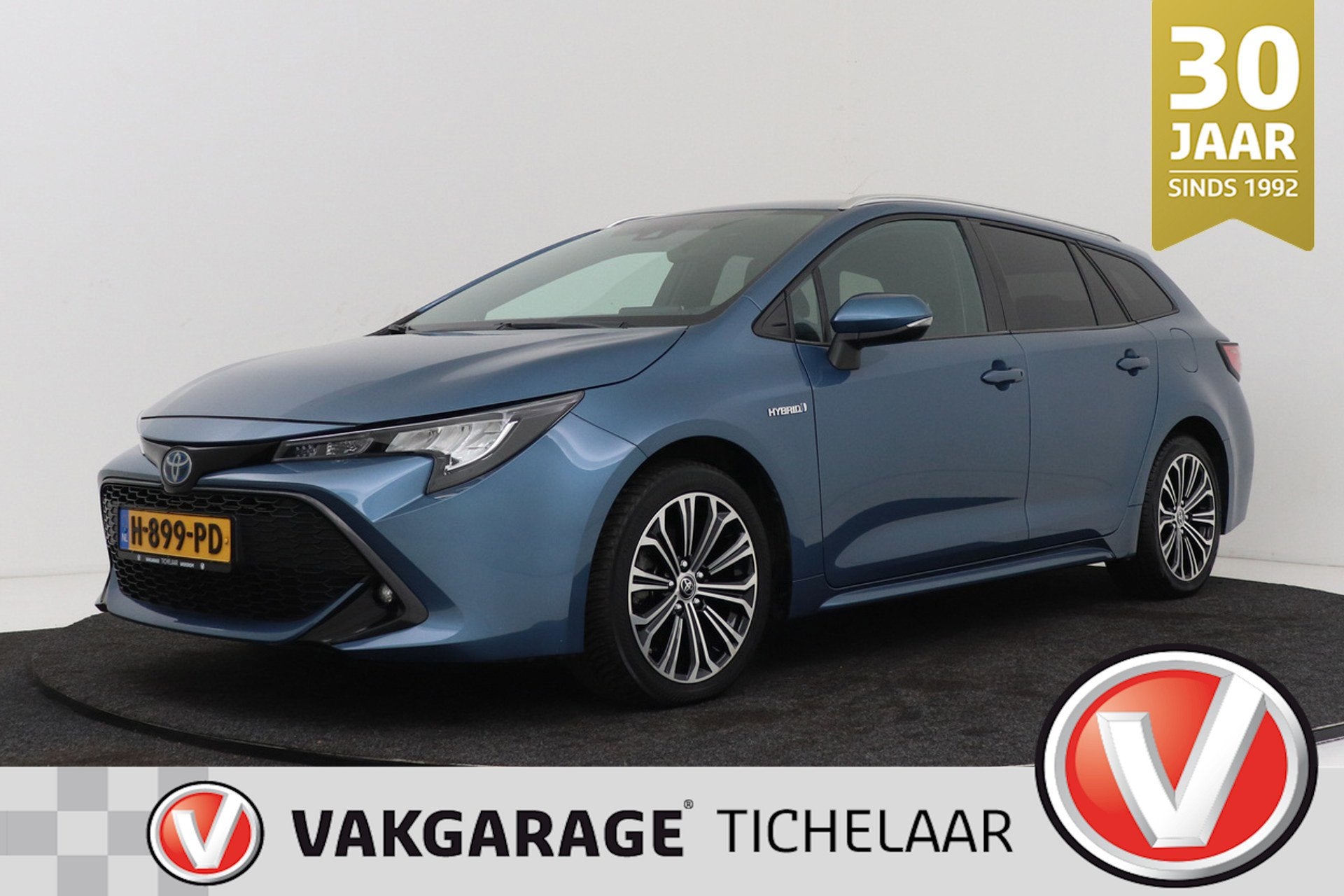 Toyota Corolla Touring Sports 1.8 Hybrid Business Plus | Org, Auto's, Gebruikt, 4 cilinders, Blauw, Corolla