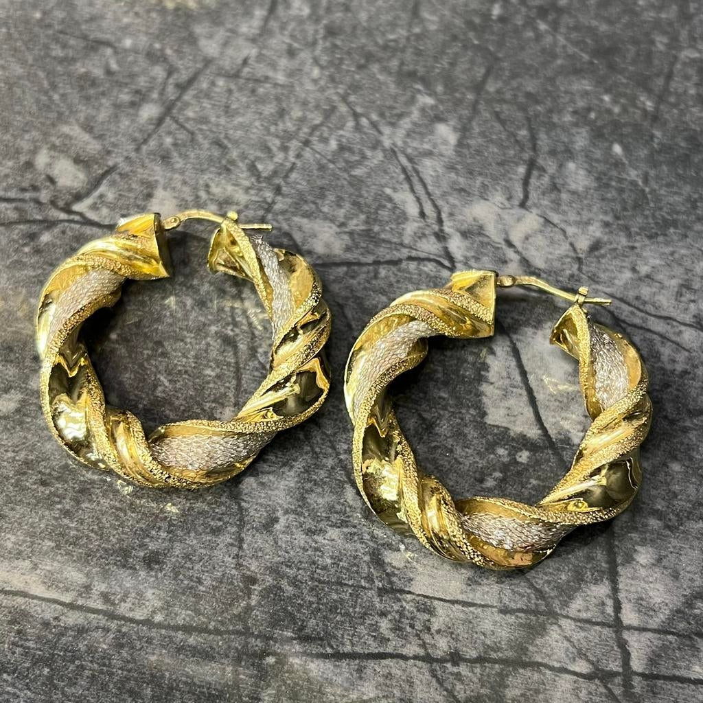 18 karaat gouden oorbellen wokkels model, Ophalen of Verzenden, Nieuw, Goud