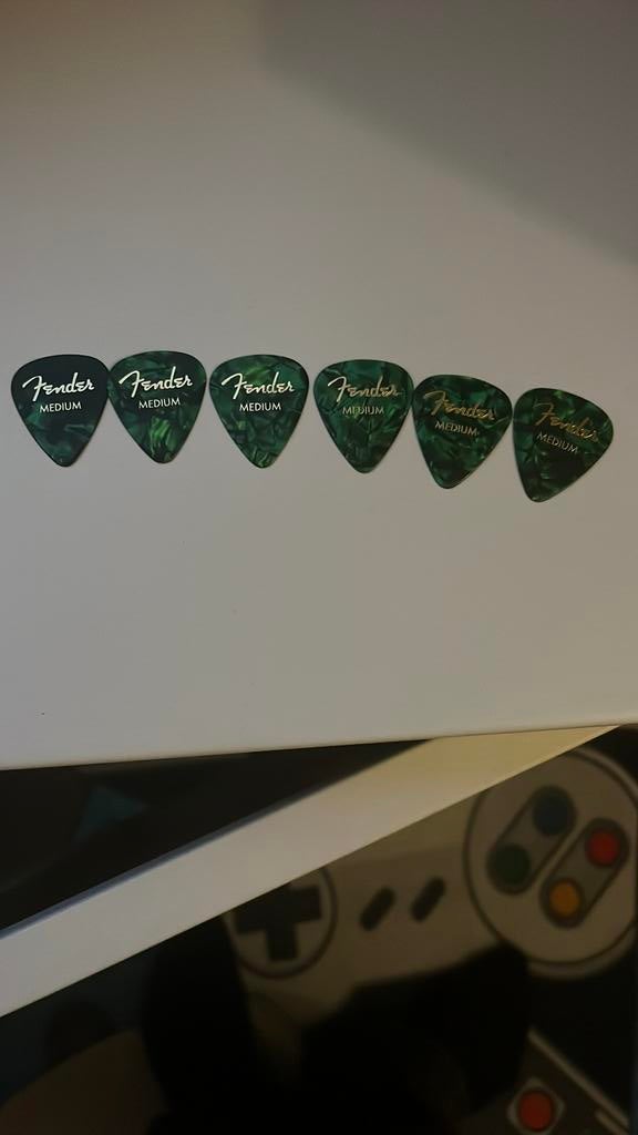 Fender plectrums, Ophalen, Zegels, Bonnen of Punten