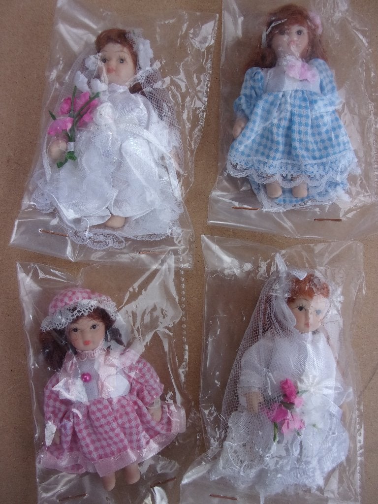 4 PORSELEINEN POPPETJES  (NIEUW in SEAL), Verzamelen, Ophalen of Verzenden, Nieuw