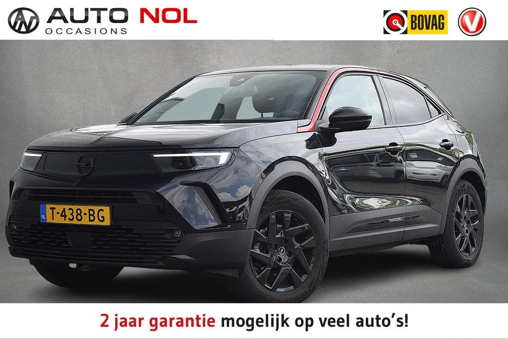 Opel Mokka Electric Level 4 50 kWh | Warmtepomp | AppleCarpl, Auto's, Opel, Gebruikt, Zwart, Mokka-e, Origineel Nederlands