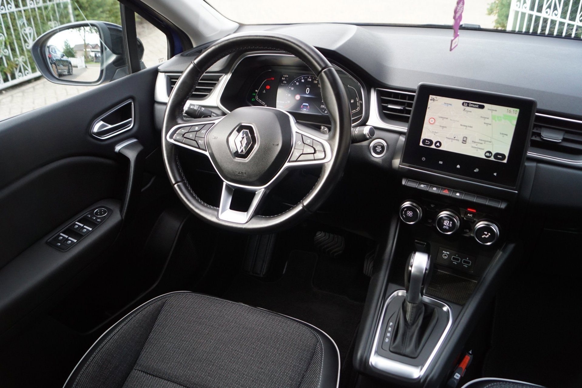 Foto 3 van Renault Captur 1.3 TCe 130 Intens Autom Half Leder/Stof Spor