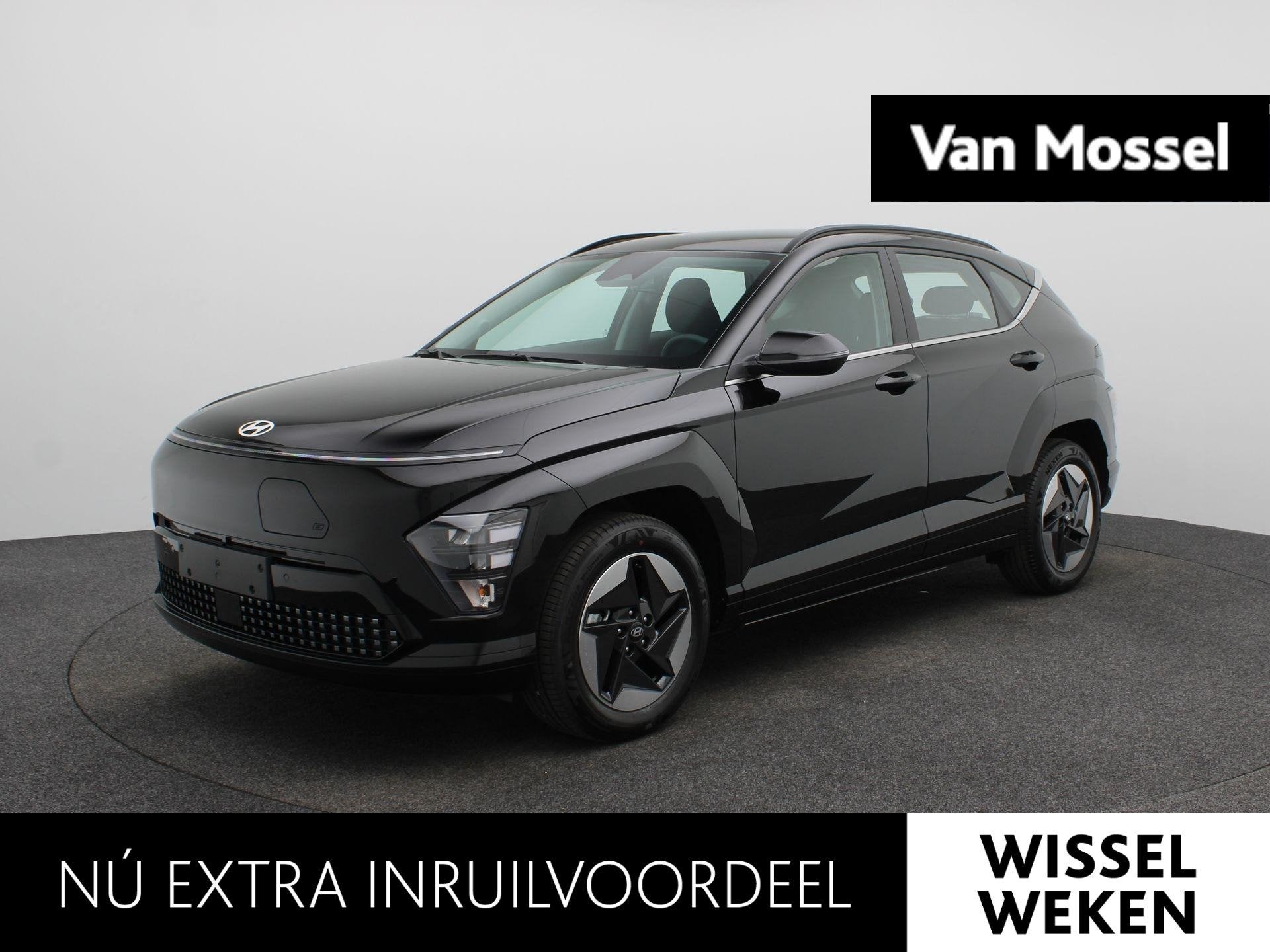 Hyundai Kona Electric Comfort 64.8 kWh | Navigatie | Achteru, Auto's, Stof, Zwart, Met garantie (alle), Zwart