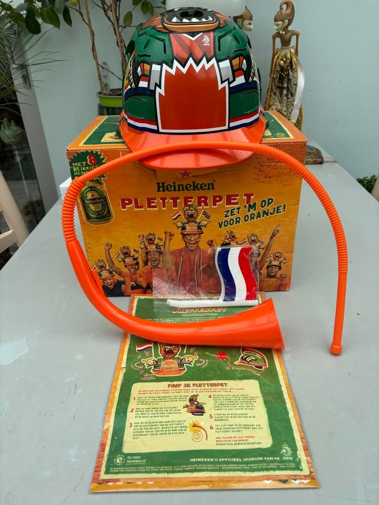 Heineken Pletterpet Oranje Fanpakket WK/EK, Ophalen of Verzenden, Zo goed als nieuw, Overige typen, Heineken