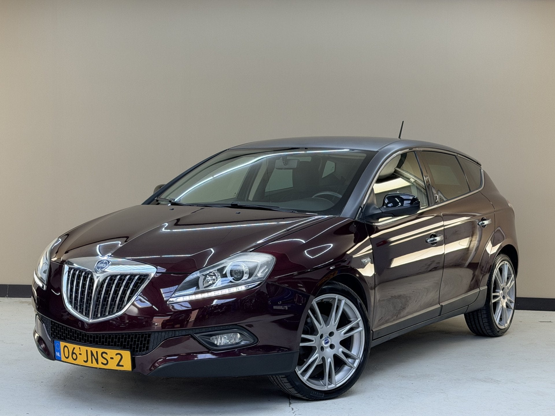 Lancia Delta 1.4-16V Oro, 120Pk, 2009, Origineel Nederlands,, Auto's, Voorwielaandrijving, 15 km/l, Gebruikt, Leder en Stof