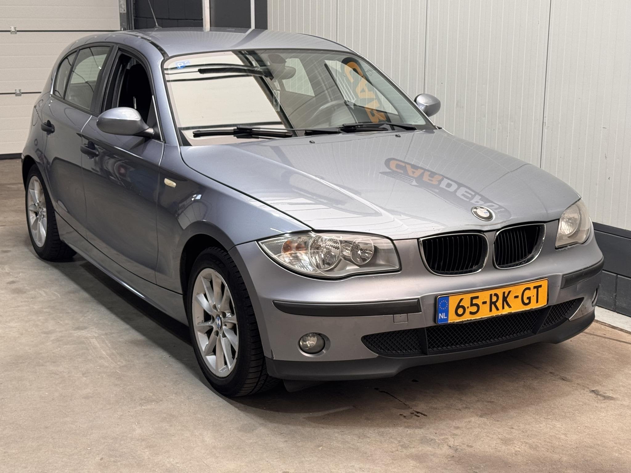 BMW 1-serie 116i, Gebruikt, Zwart, 4 cilinders, 116 pk