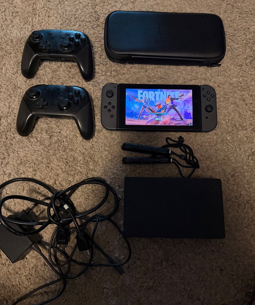Nintendo Switch v2 + 2 pro controllers +spelletjes, Met 2 controllers, Ophalen, Switch 2019 Upgrade, Gebruikt