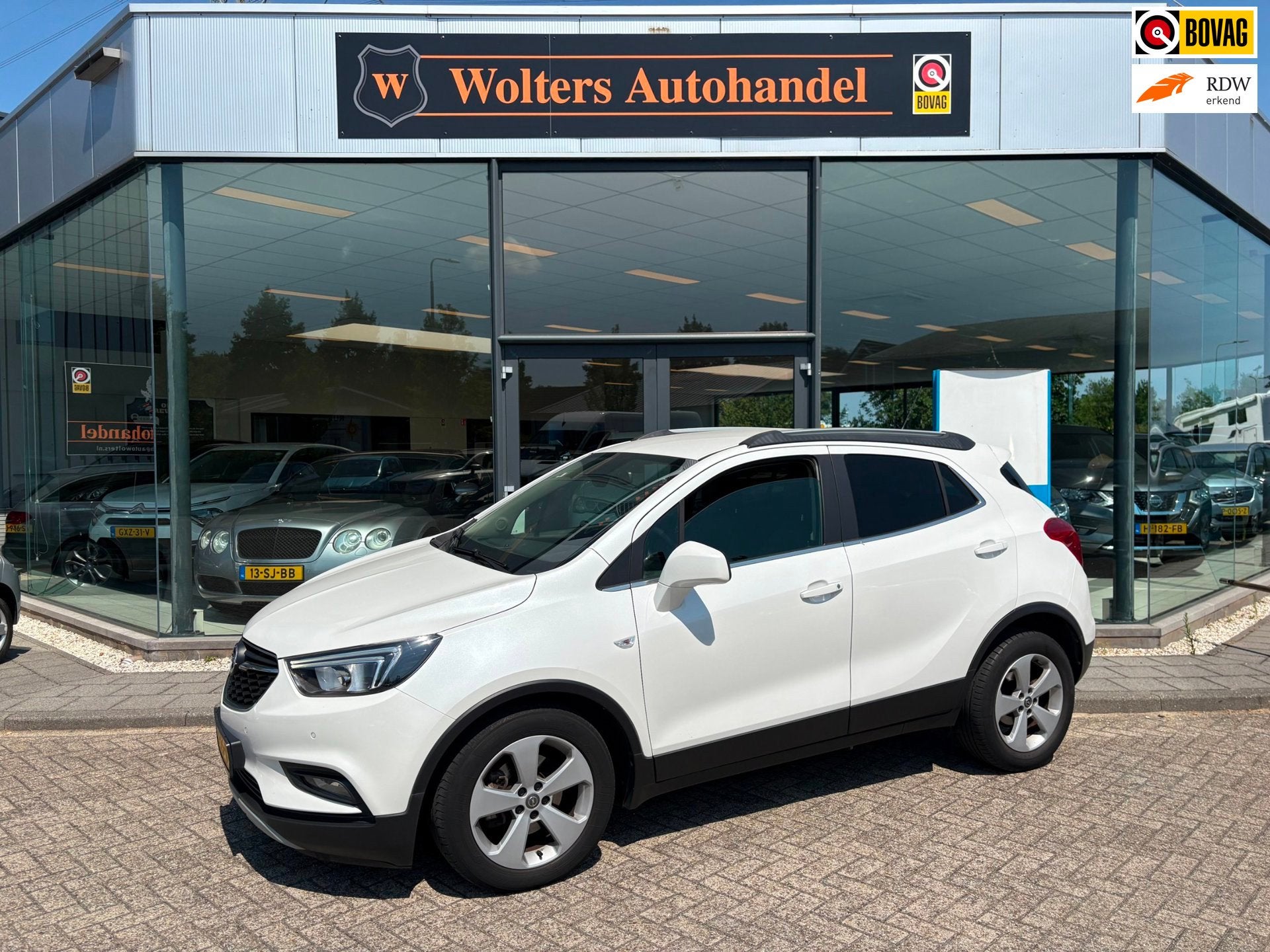 Opel Mokka X 1.4 Turbo Online Edition, Auto's, Opel, Voorwielaandrijving, Gebruikt, Wit, Leder