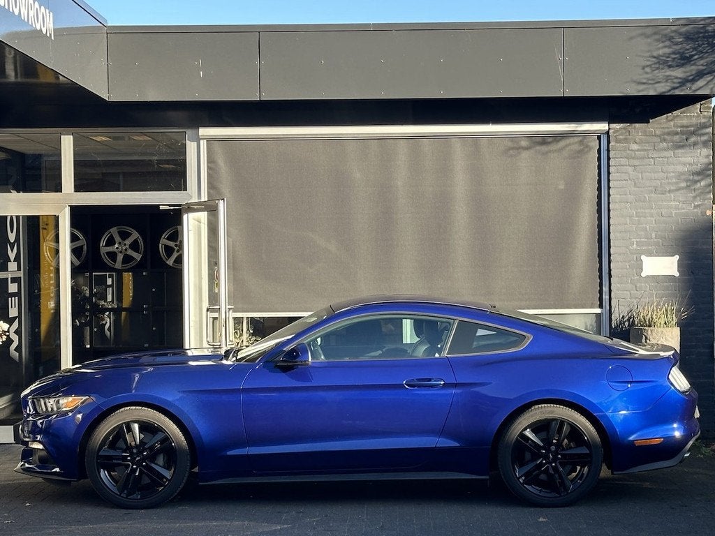 Ford Mustang Fastback 2.3 EcoBoost ZOMERDEAL VAN €29995 NA, Auto's, Ford, 13 km/l, Gebruikt, Euro 6, 2261 cc