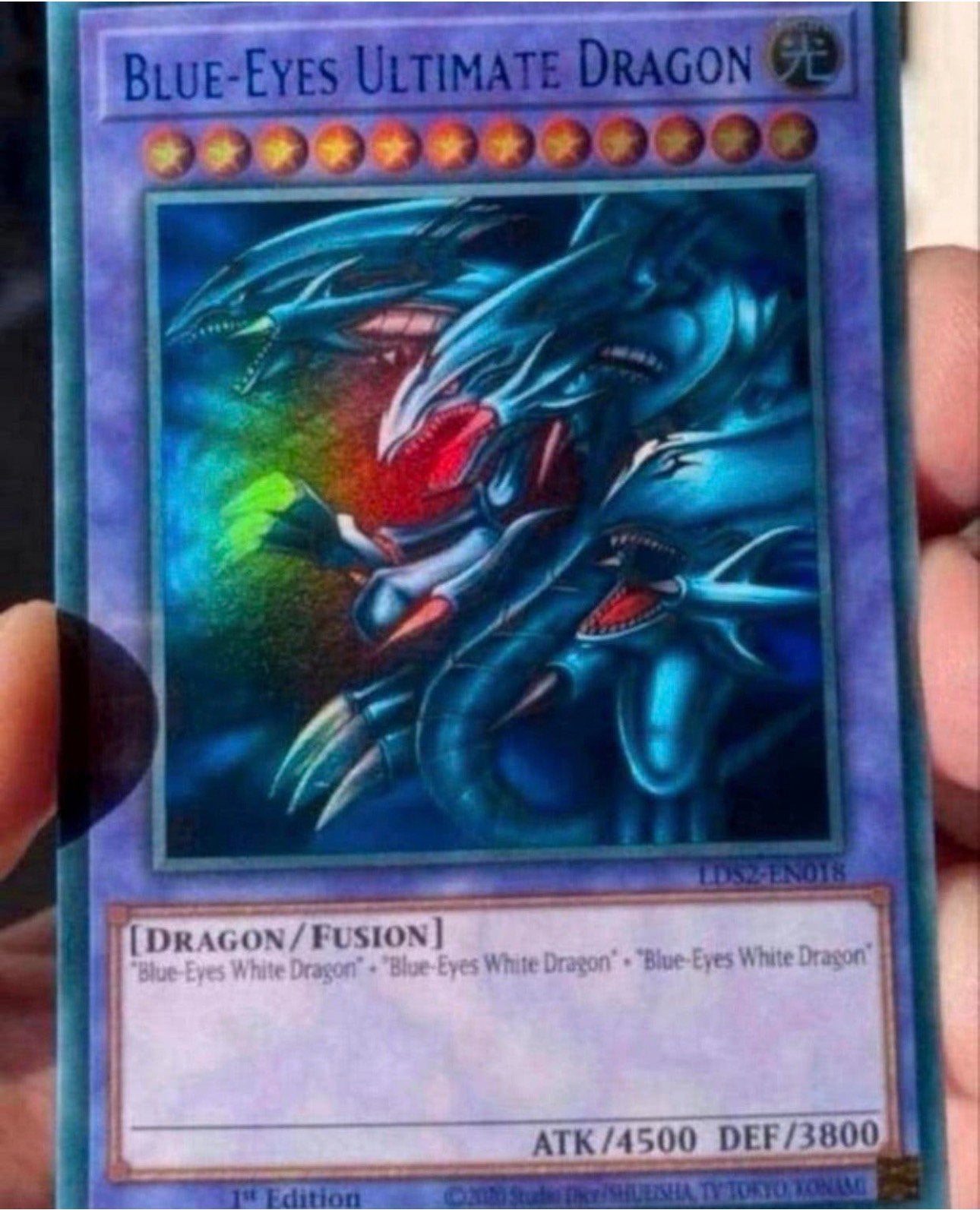 Yu-Gi-Oh! Blue Eyes Ultimate Dragon LDS2 1st Edition !, Hobby en Vrije tijd, Ophalen of Verzenden, Gebruikt, Losse kaart, Foil