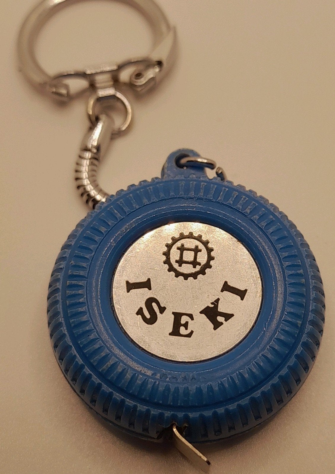 Sleutelhanger met meetlint in autoband design - Iseki, Ophalen of Verzenden