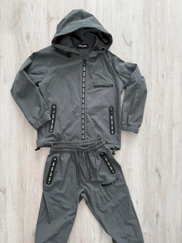 Icon trainingspak antraciet grijs wind regenpak nieuw 116, Kinderen en Baby's, Kinderkleding | Maat 116, Ophalen of Verzenden