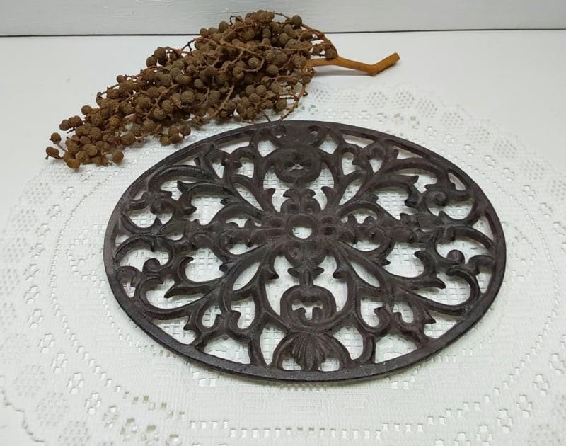 Gietijzeren onderzetter,  ornament, Antiek en Kunst, Curiosa en Brocante, Ophalen of Verzenden