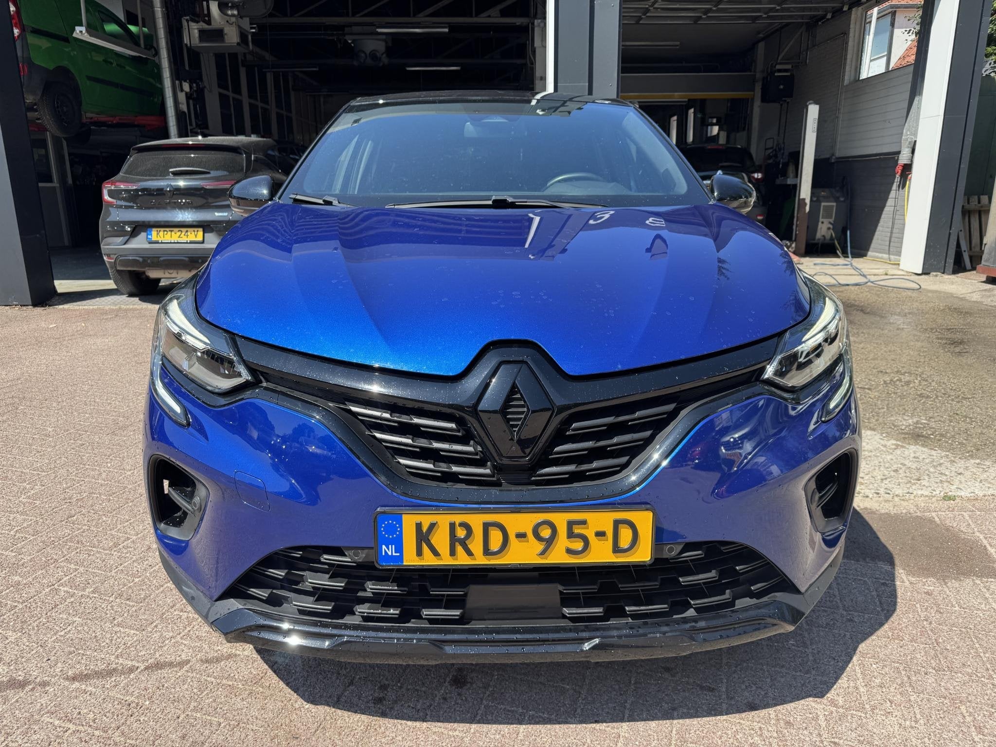 Renault Captur 1.6 E-Tech Hybrid 145pk Rive Gauche, Auto's, Renault, Gebruikt, 715 kg, Blauw, Leder en Stof