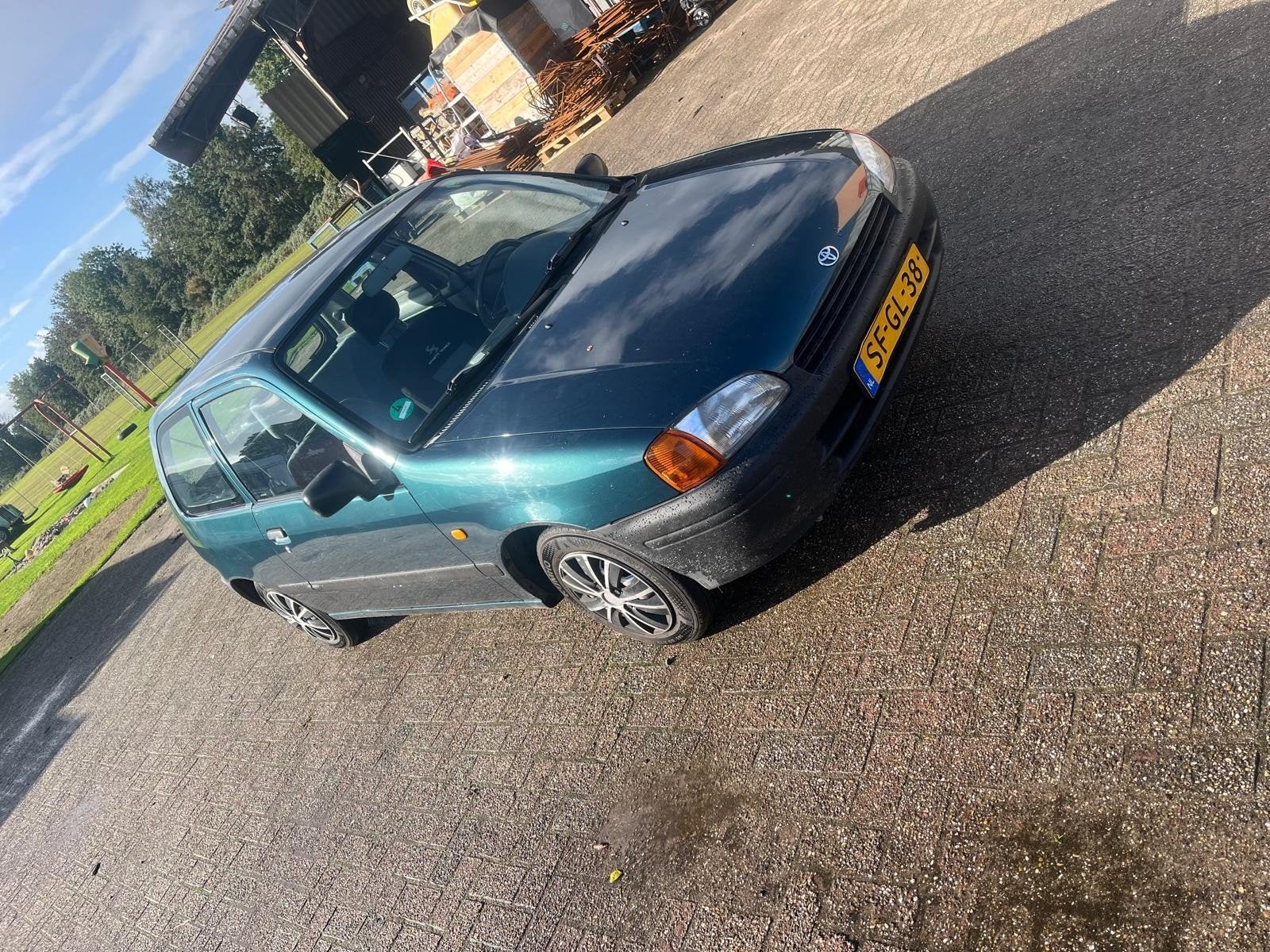 Toyota Starlet 1.3 16V 1997 Groen, Auto's, 4 cilinders, Starlet, 400 kg, Origineel Nederlands