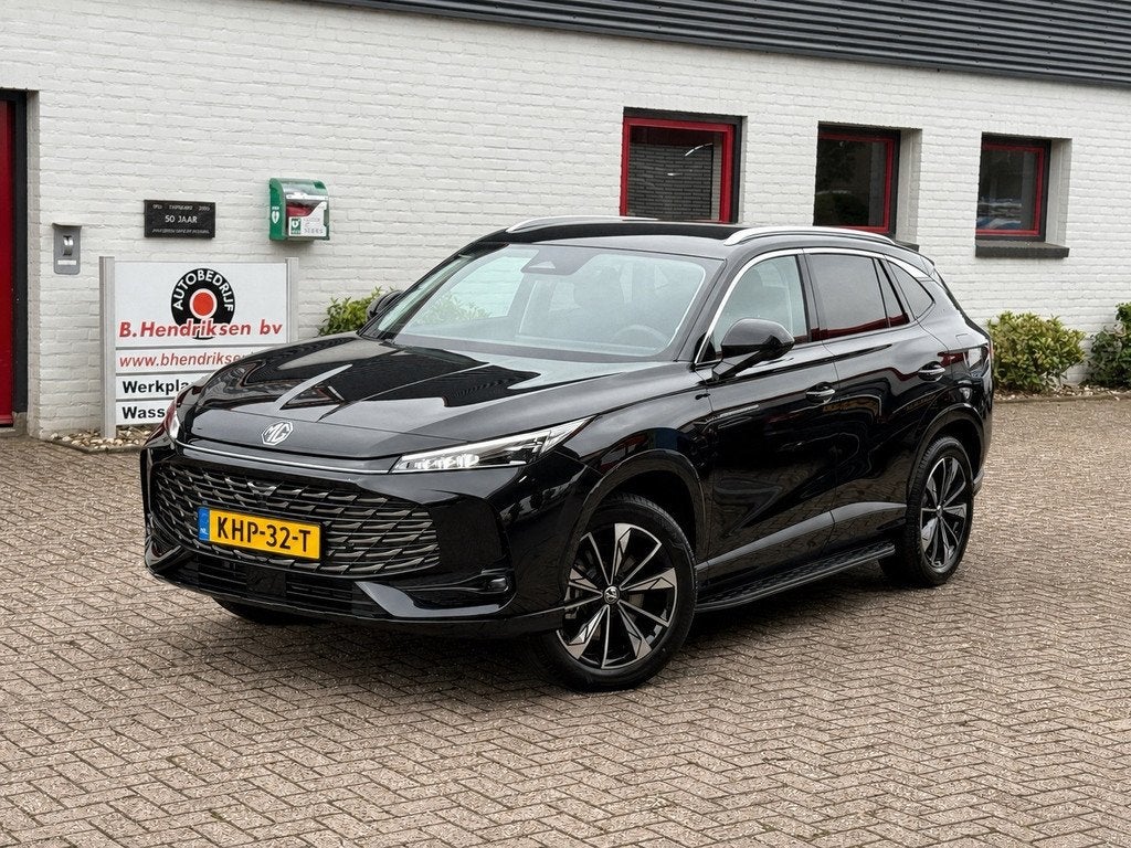 MG Hs 1.5T GDI PHEV Aut Comfort/ Nieuwe voorraad auto/ 100 K, Auto's, MG, Stof, Gebruikt, 4 cilinders, Zwart