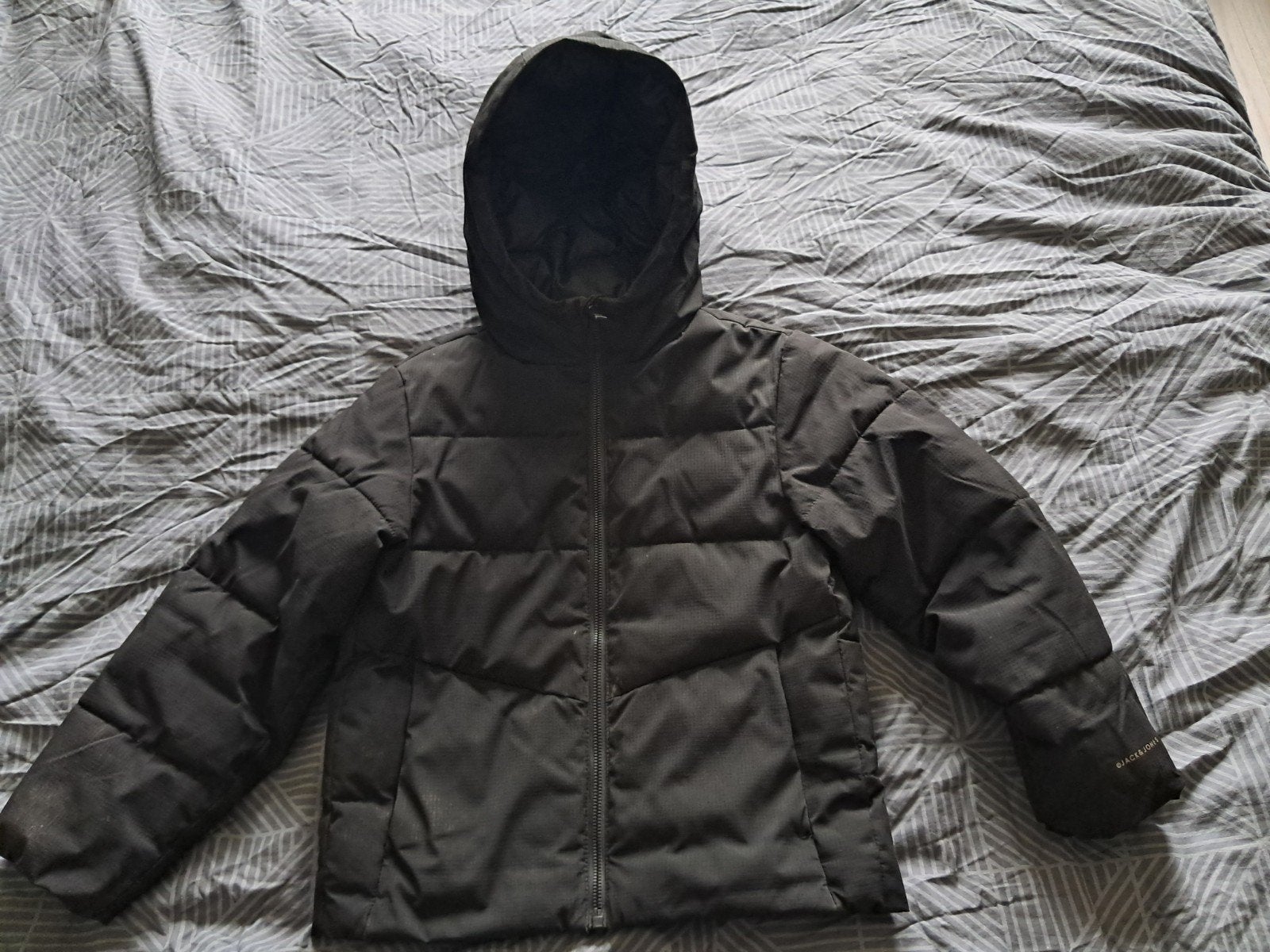 Jongens Jack & Jones gewatteerde winterjas 128, Ophalen of Verzenden, Zo goed als nieuw