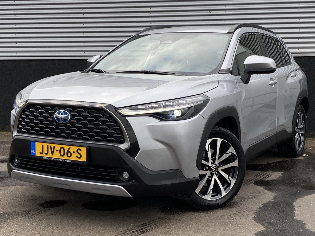 Toyota Corolla Cross Hybrid 200 Dynamic Navigatie Apple CarP, Auto's, Toyota, Stof, 4 cilinders, 1415 kg, Bedrijf