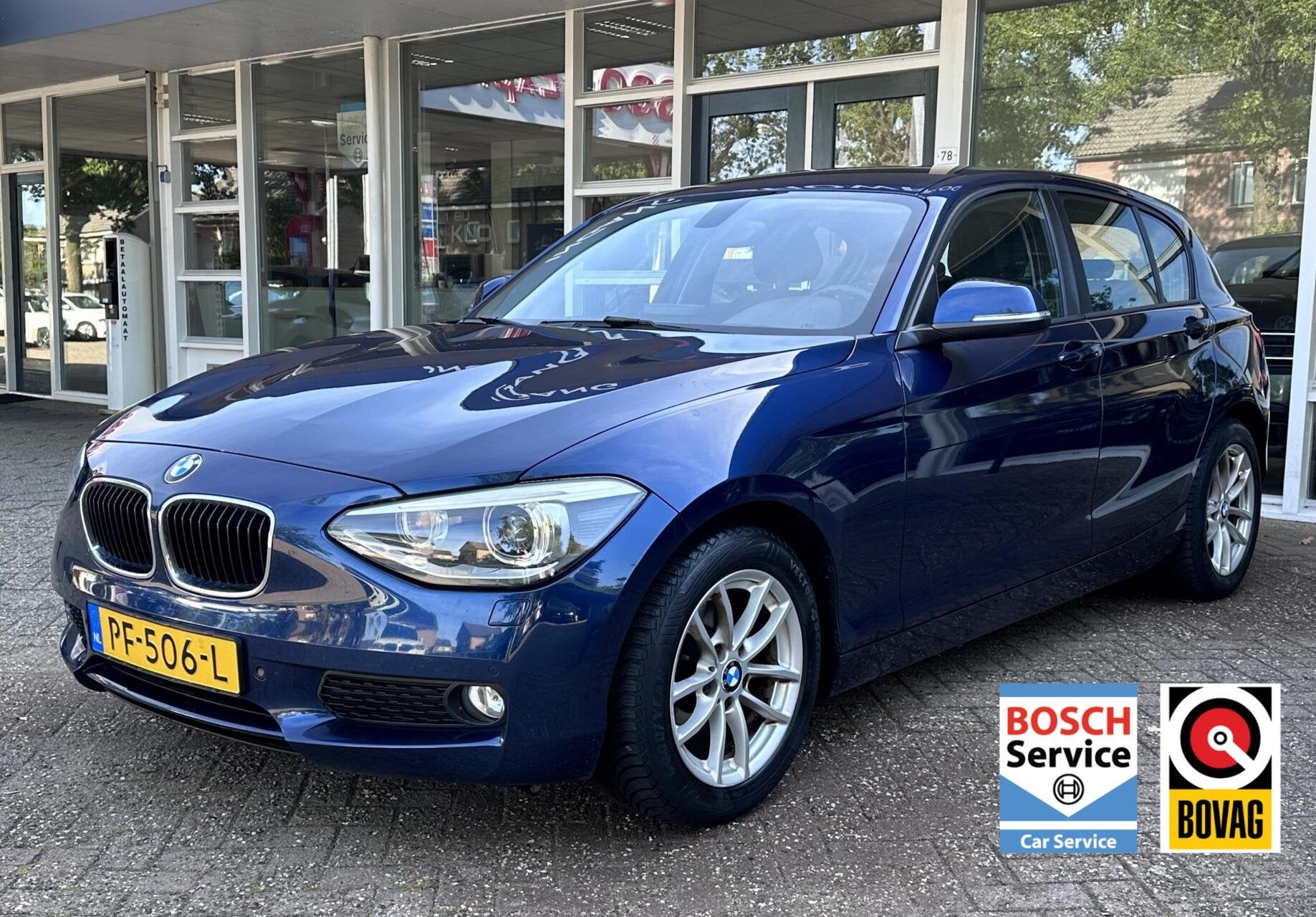 BMW 1-serie 116i Business Urban Xenon/Led, Navi, Bluetooth,, Euro 5, Gebruikt, Met garantie (alle), Blauw