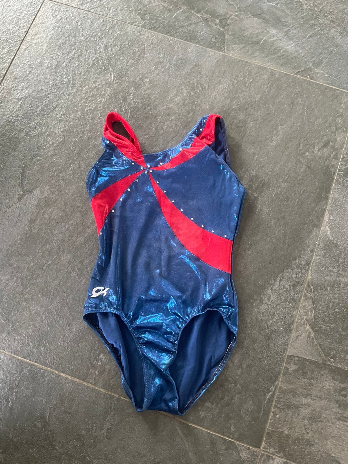 Turnpakje glimmend  blauw rood, Sport en Fitness, Turnen, Kindermaat 122 t/m 140, Ophalen of Verzenden, Zo goed als nieuw, Turnpak(je)