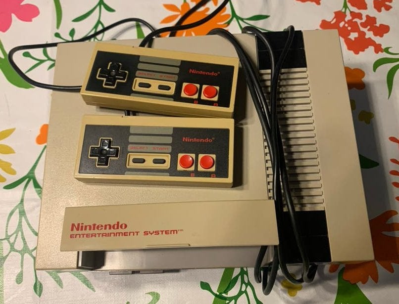 Nintendo Entertainment System (NES) met 12 games, Avontuur en Actie, Gebruikt, 2 spelers, Eén computer