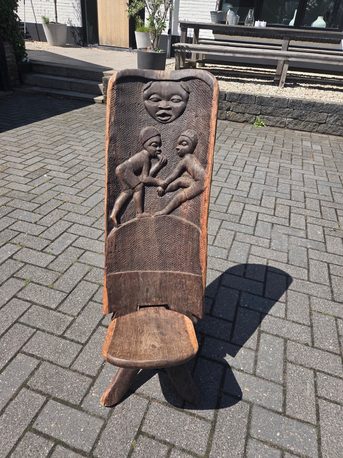 Vintage Afrikaanse vouwstoel met houtsnijwerk, Antiek en Kunst, Ophalen