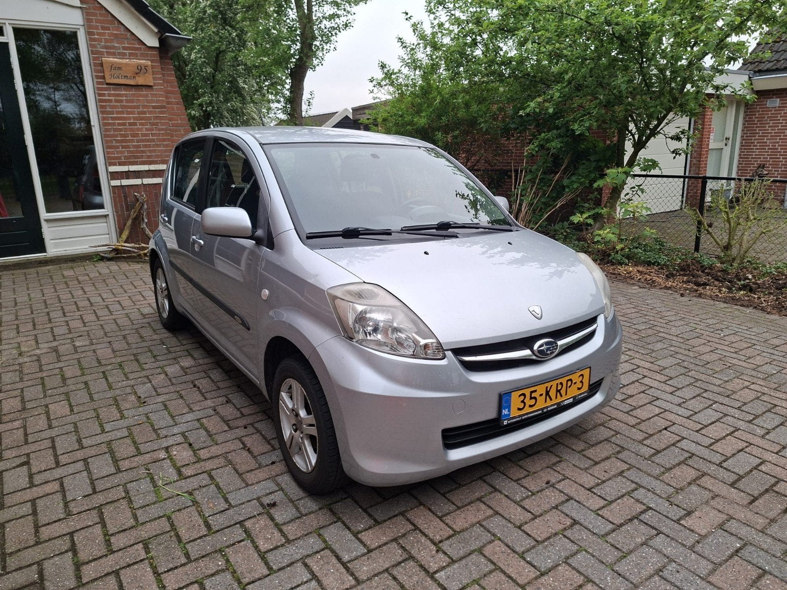 Subaru Justy 1.0 2010 Grijs met airco