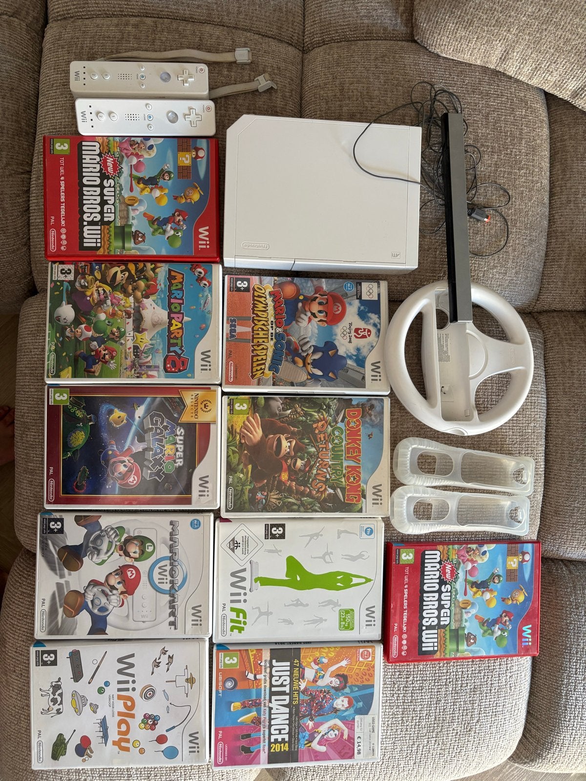 Nintendo Wii Bundel met 10 games, 2 controllers en stuur, Ophalen of Verzenden, Gebruikt, Met 2 controllers, Met games