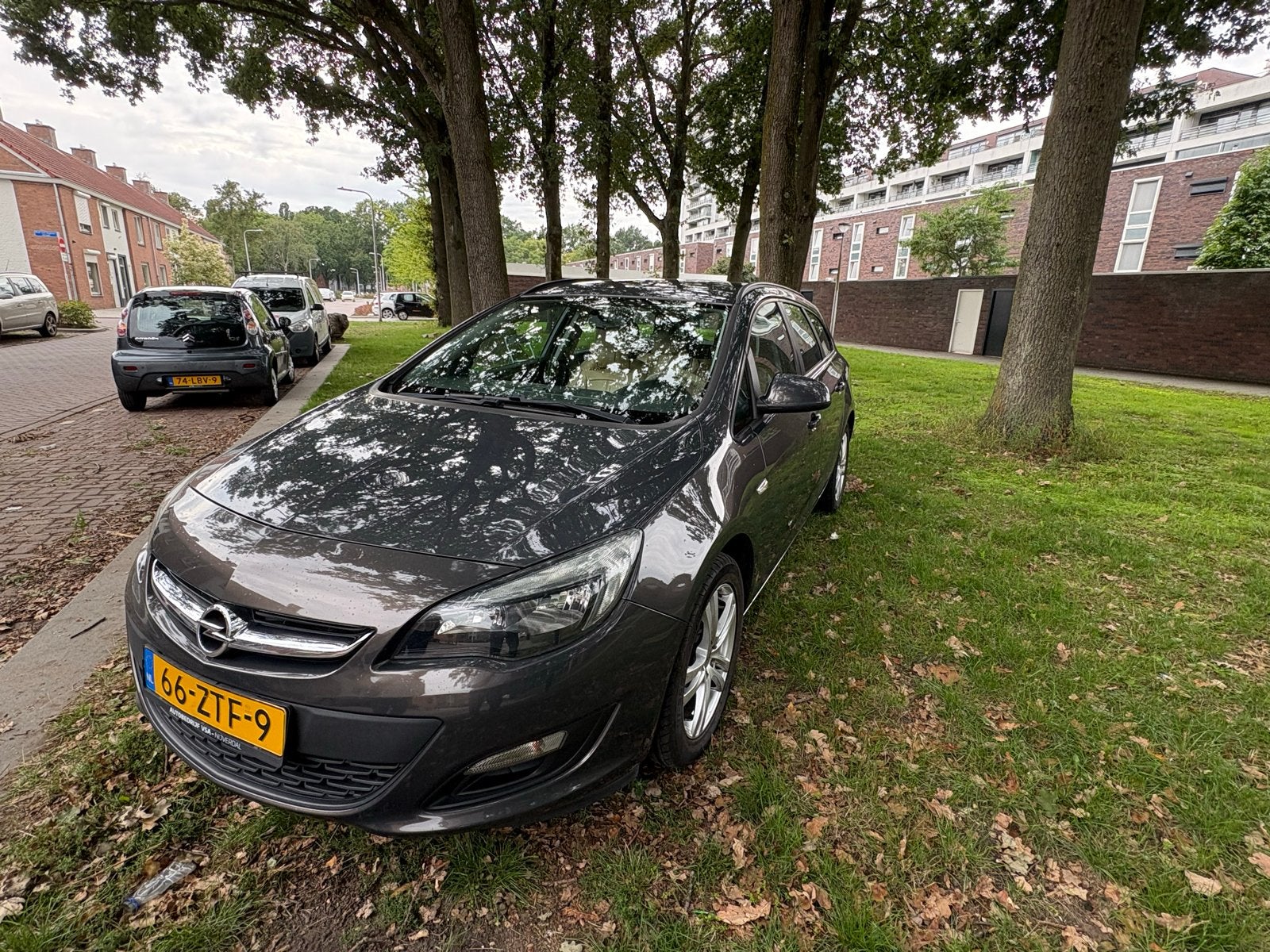 Opel Astra 1.4 Turbo 74KW Sports Tourer 2013 Grijs, Voorwielaandrijving, 4 cilinders, 100 pk, Origineel Nederlands