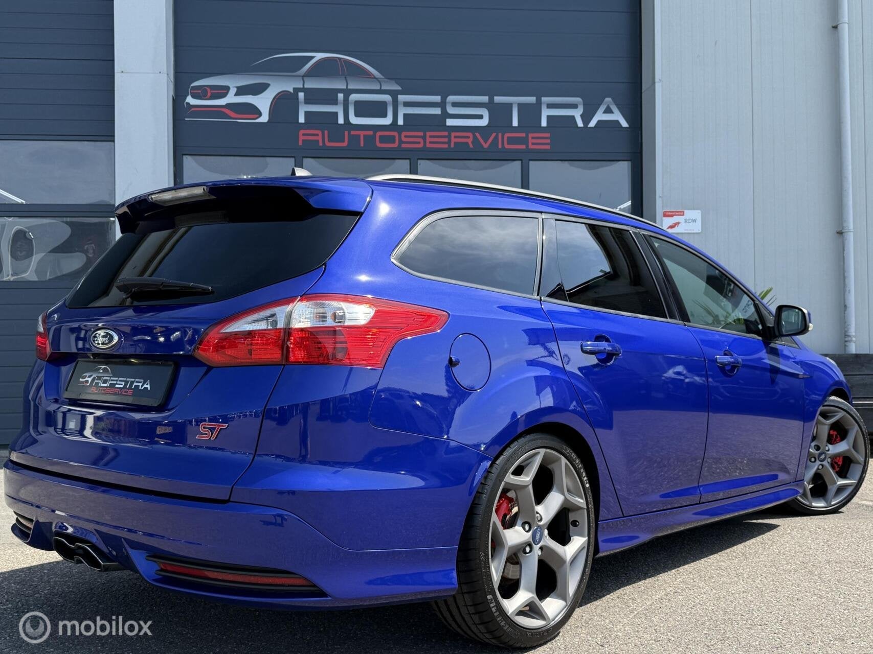 Ford Focus Wagon 2.0 EcoBoost ST-2 Stoelverw 19inch UNIEK!, Euro 5, Gebruikt, Blauw, Handgeschakeld