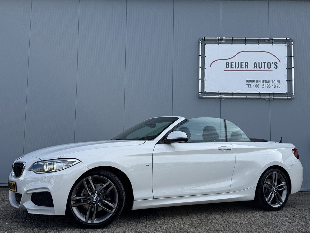BMW 2 Serie Cabrio 218i High Executive Automaat van €23.49, Auto's, BMW, Automaat, Gebruikt, Cabriolet, 4 stoelen