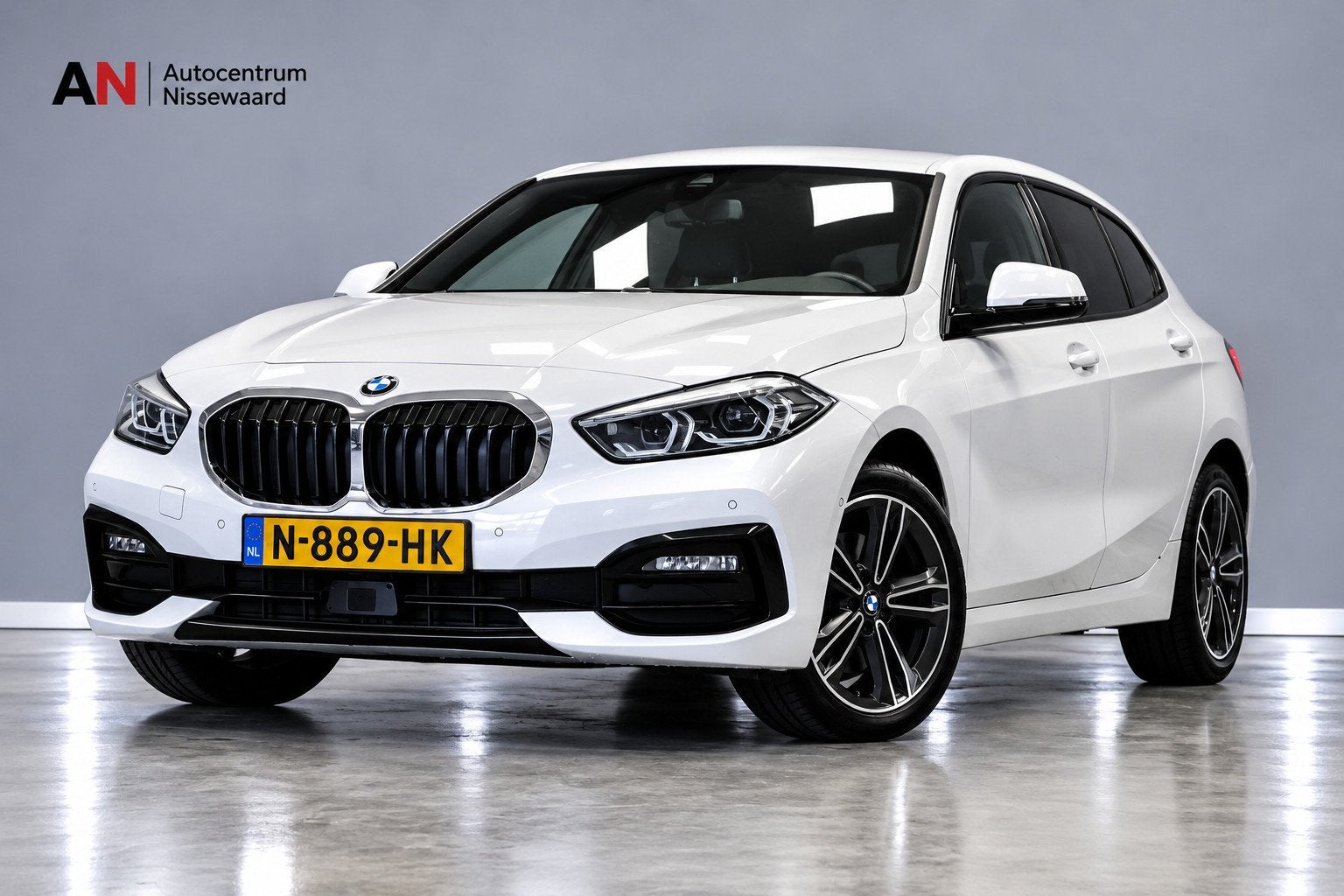 BMW 1-serie 118i Sport Business |Adaptive|Camera|, Auto's, Dealer onderhouden, 136 pk, Gebruikt, Leder en Stof