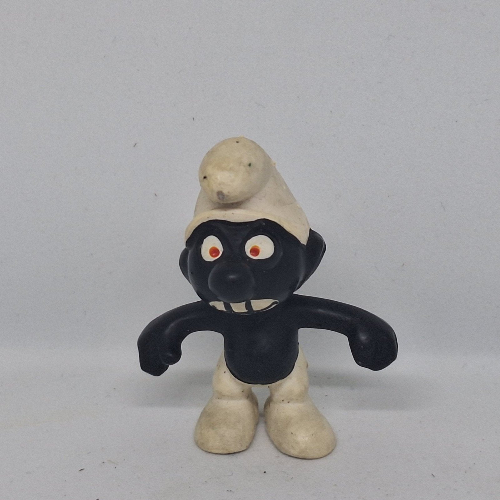 Zwarte Smurf 20007 - Zwart tussen de tanden, Verzamelen, Smurfen, Ophalen of Verzenden