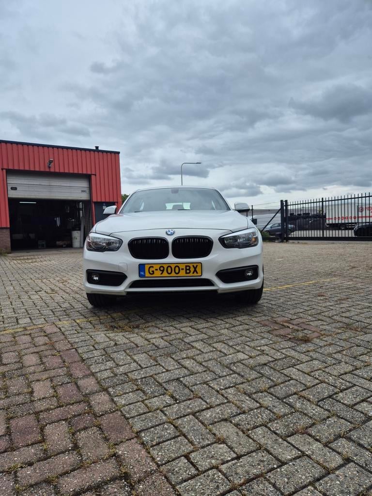 BMW 1-Serie 116i 109pk 2015 Wit, Auto's, 1-Serie, Achterwielaandrijving, 1280 kg, Wit