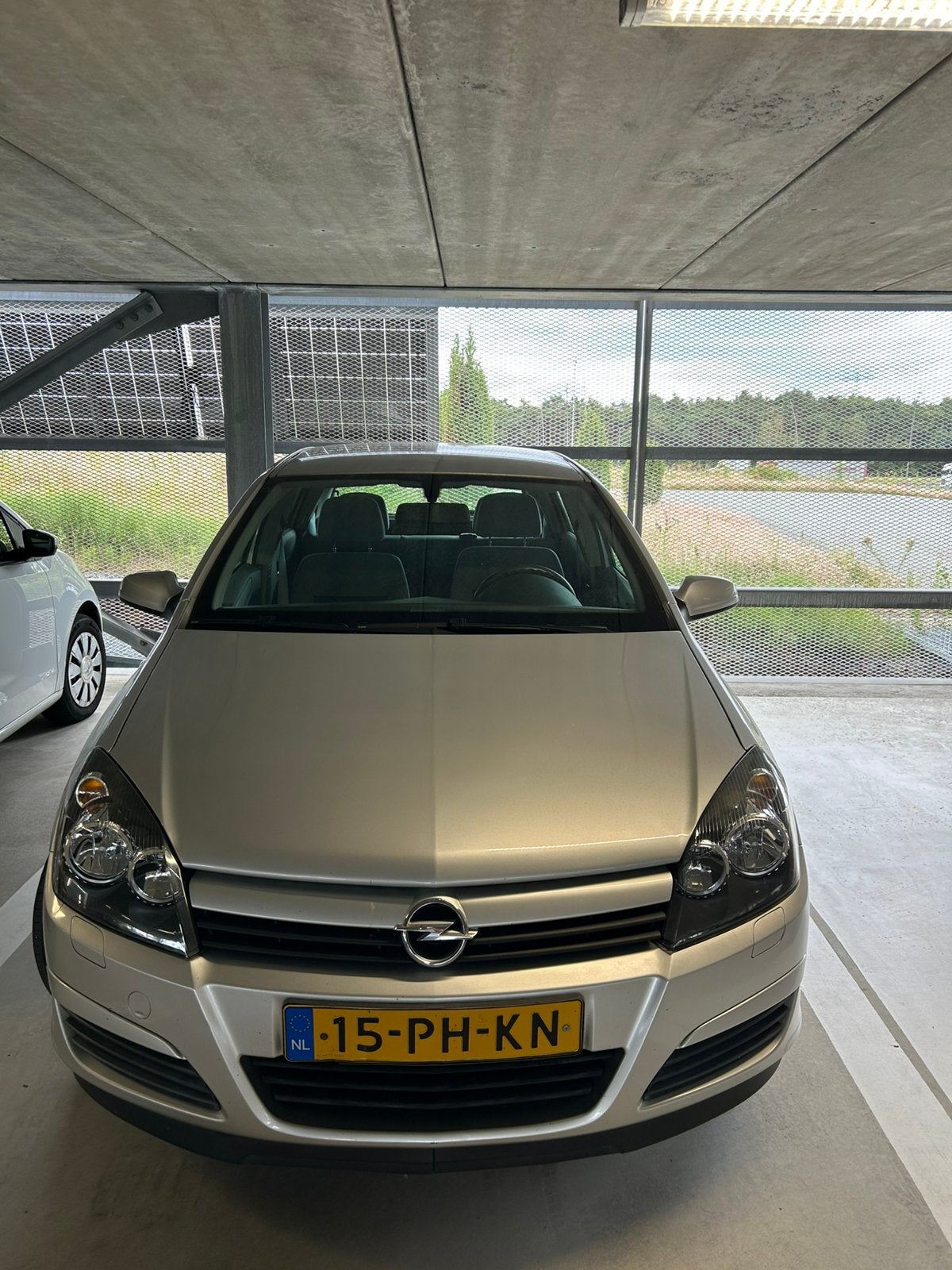 Opel Astra 1.4 16V 5D 2004 Grijs Airco/Cruise control - ABS, Auto's, Voorwielaandrijving, 4 cilinders, 49 €/maand, Handgeschakeld