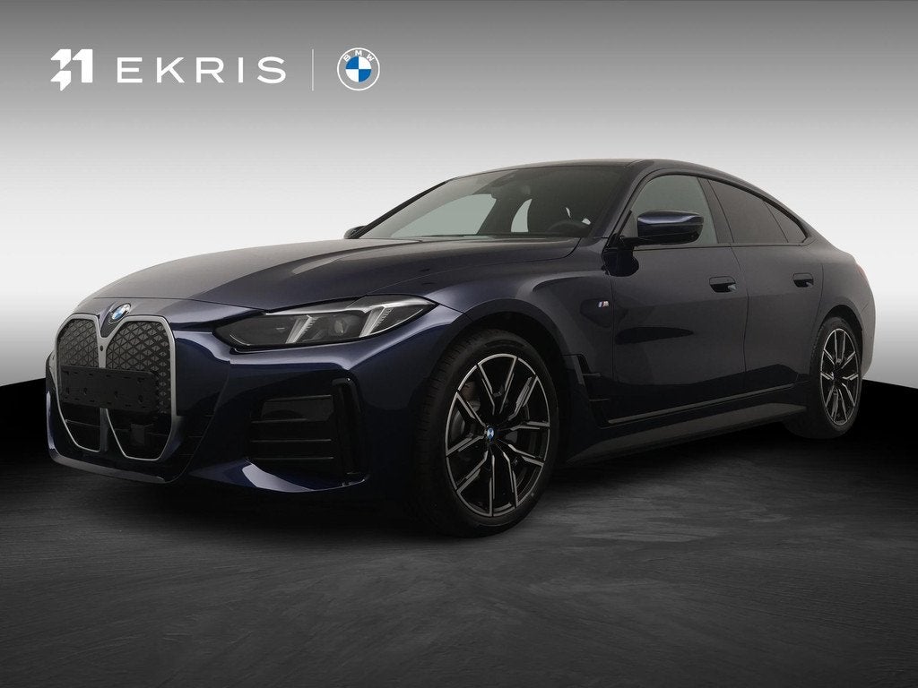 BMW i4 eDrive40 84 kWh | SoH 100% | M-Sport | Trekhaak | Com, Auto's, BMW, Achterwielaandrijving, 510 min, Overige kleuren, 340 pk