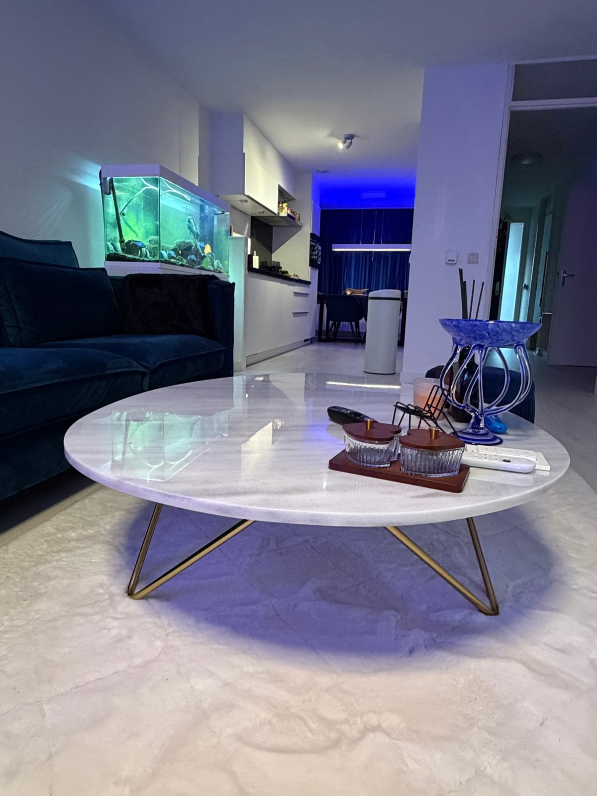 Ovale salontafel met marmer blad en gouden poten, Ophalen, 100 tot 150 cm, 50 tot 100 cm, Zo goed als nieuw