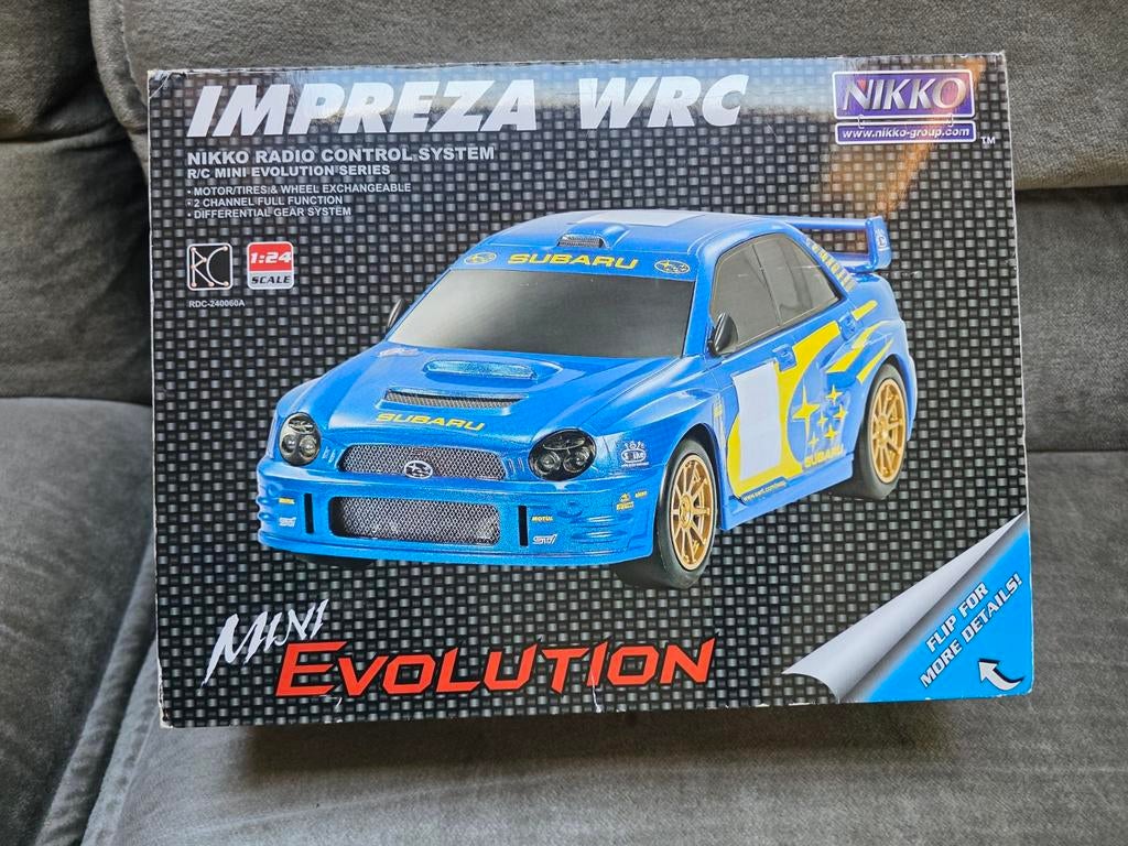 Nikko rc evolution subaru 2003 bestuurbare auto, Ophalen of Verzenden, Overige merken