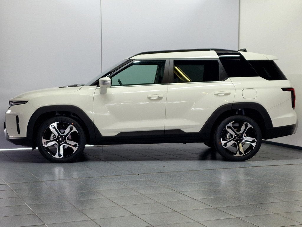 KGM Torres Hybrid 1.5T-GDI Titanium Automaat, TomTom Navigat, Auto's, Overige Auto's, 1498 cc, 4 cilinders, 2 kWh, Wit