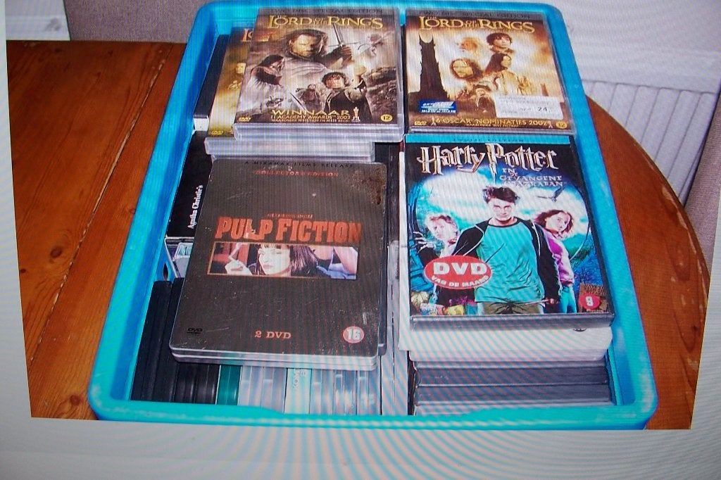 krat met ongeveer 80 dvd's, Alle leeftijden, Ophalen, Gebruikt