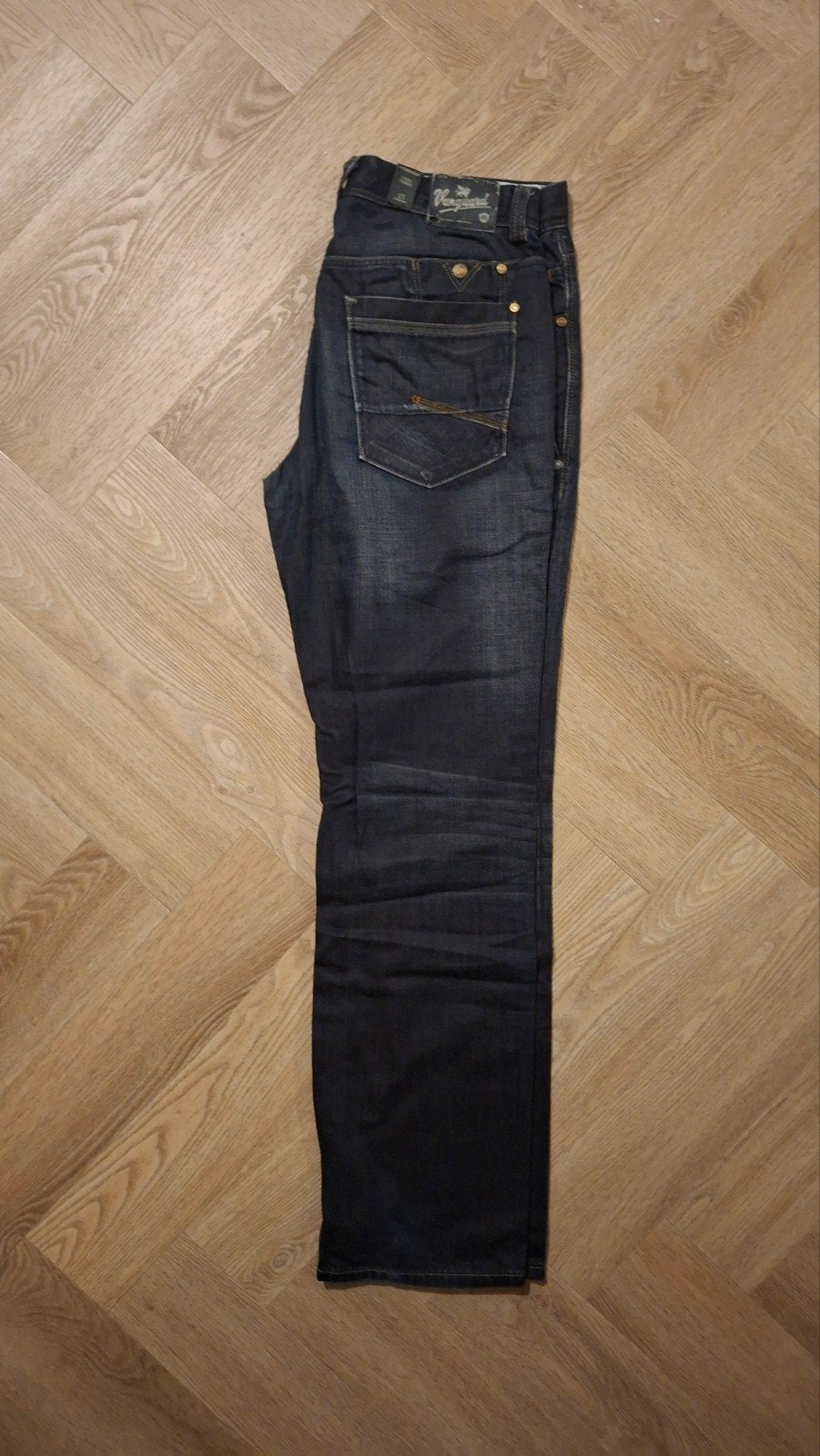 Vanguard Jeans - Donkerblauw met kleine beschadiging, Kleding | Heren, Blauw, Overige jeansmaten, Ophalen of Verzenden, Vanguard