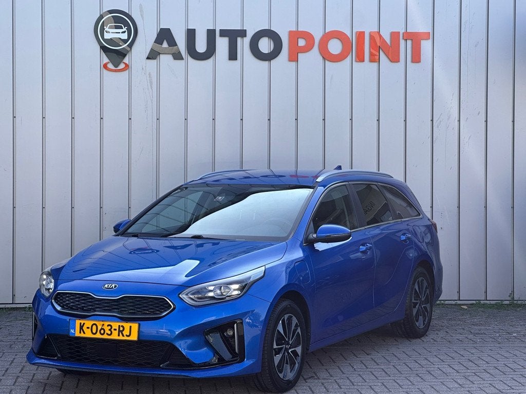 Kia Ceed Sportswagon 1.6 GDI PHEV Dynamic+Line 1E EIG ORG NL, Auto's, Kia, 8 kWh, Gebruikt, Blauw, Leder en Stof