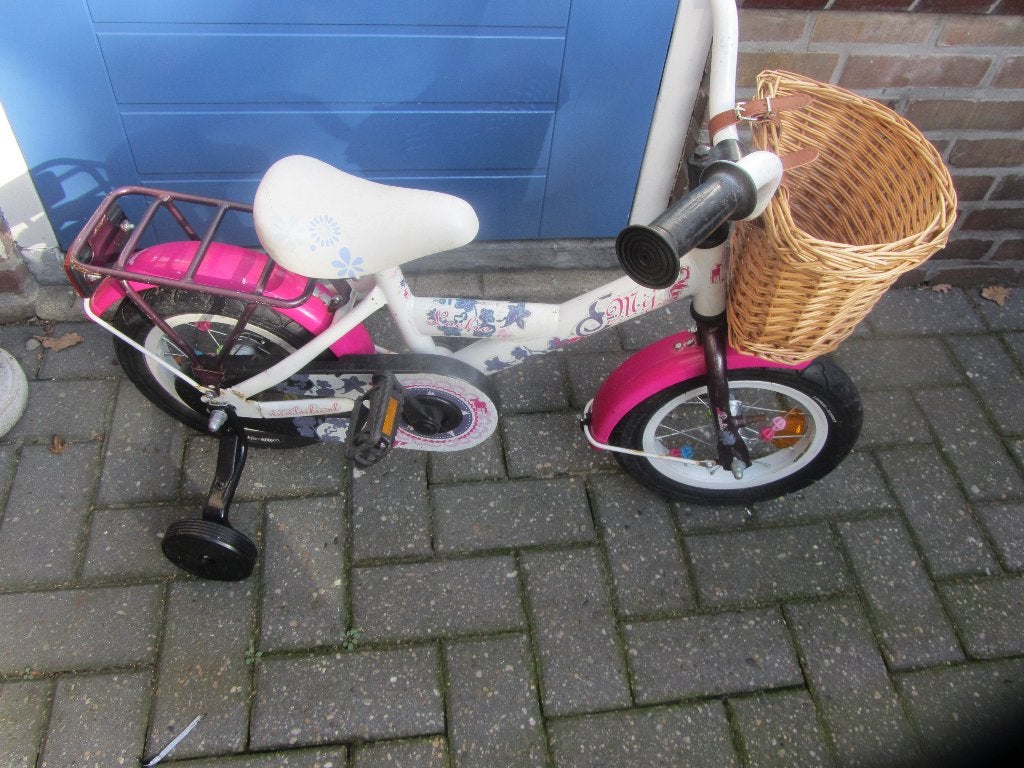 te koop kinderfiets van 12 inch, Fietsen en Brommers, Ophalen, Terugtraprem, Zijwieltjes, Gebruikt