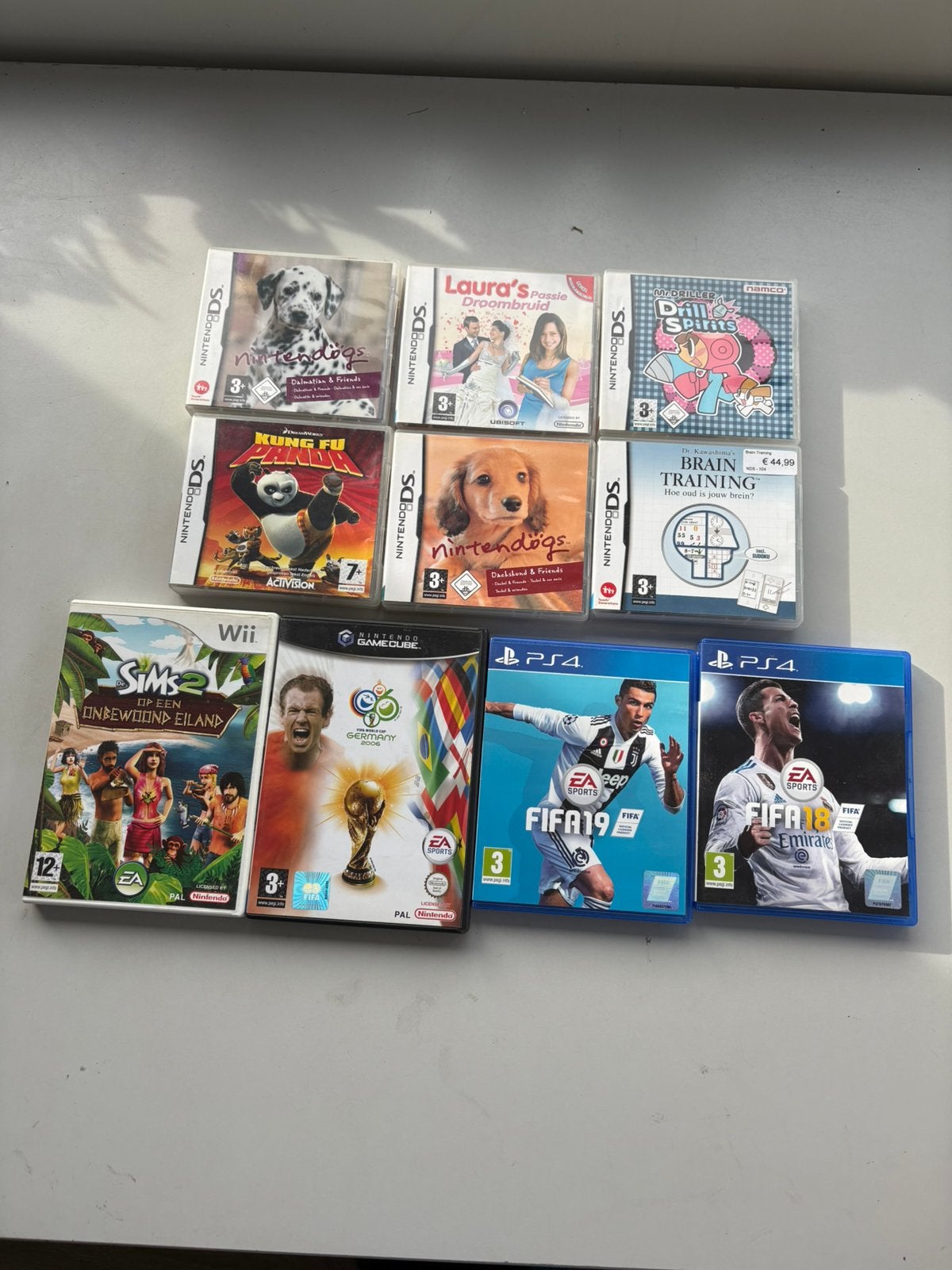 Partij 10 games Nintendo DS Wii GameCube PS4 FIFA Nintendogs, Gebruikt, Verzenden, Overige genres, 1 speler