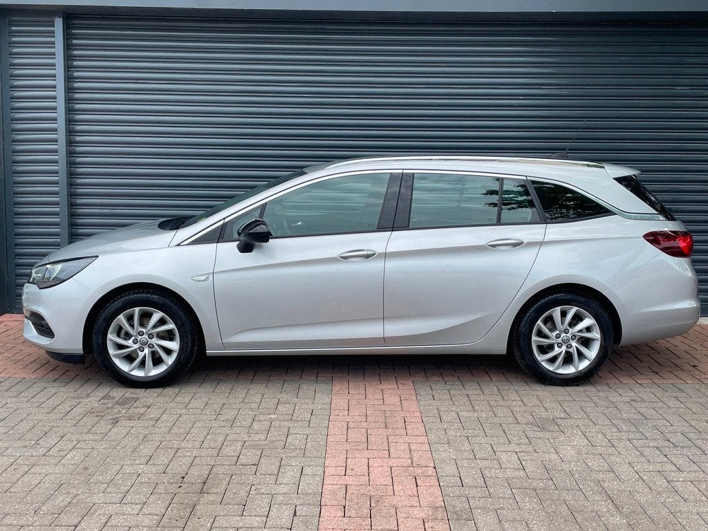 Opel Astra Sports Tourer 1.2 Business Elegance Lane Ass | Ca, Auto's, Opel, Voorwielaandrijving, Stof, Gebruikt, Euro 6