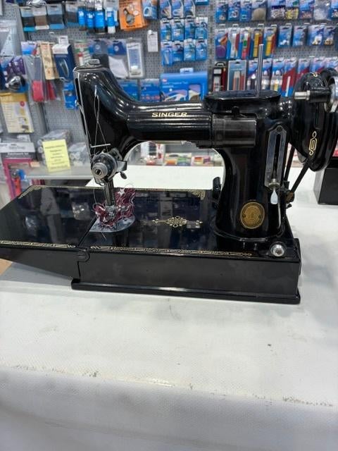 Singer 221K, Ophalen