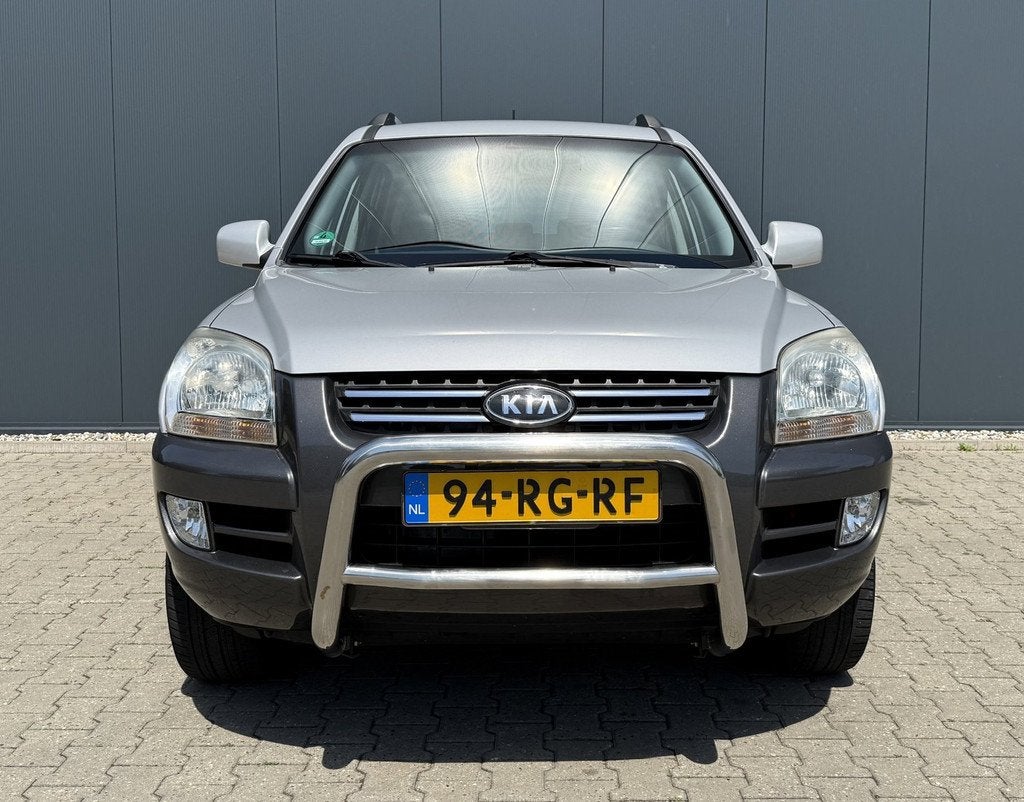 Kia Sportage 2.7 V6 Adventure 4WD Airco Cruise Trekhaak Nieu, Auto's, Kia, Automaat, Stof, Gebruikt, Zwart