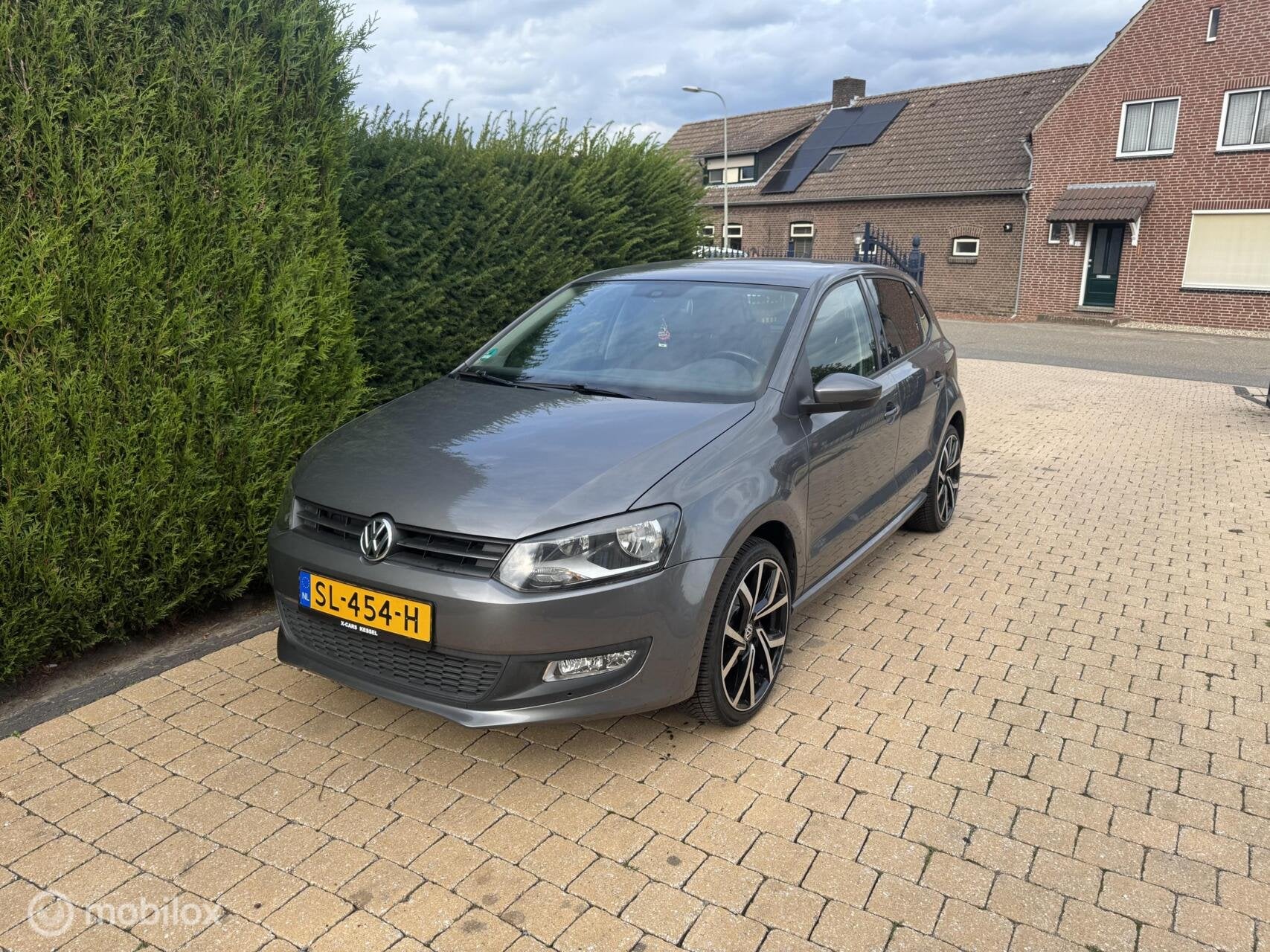 Volkswagen Polo 1.4-16V MET COMPLEET GEREVISEERDE MOTOR, Auto's, Voorwielaandrijving, Gebruikt, 4 cilinders, Stoelverwarming