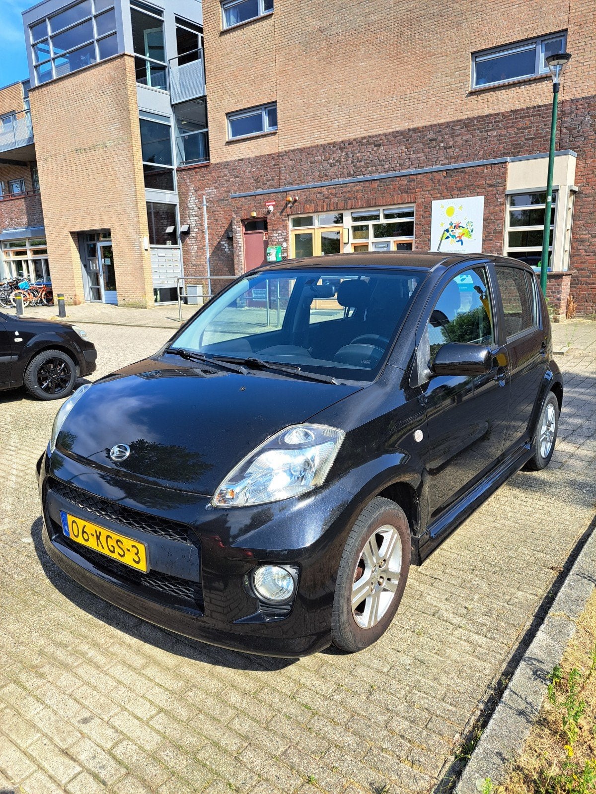 Daihatsu Sirion 1.3 2009 Zwart, Auto's, Daihatsu, Voorwielaandrijving, 31 €/maand, 4 cilinders, Zwart